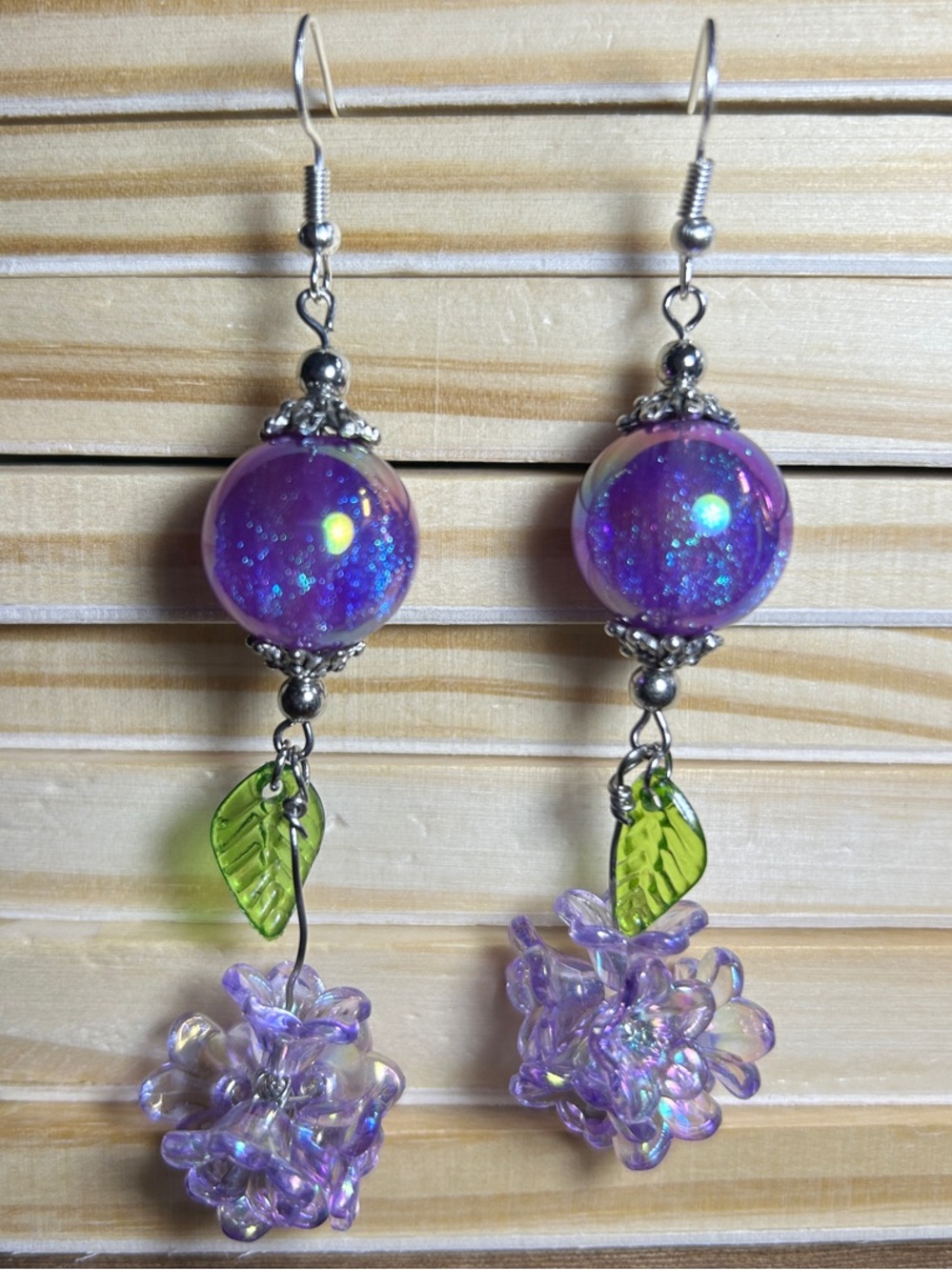 3/$25 Purple Glass Orb & Flower Drop Earrings with Green Leaf Accent